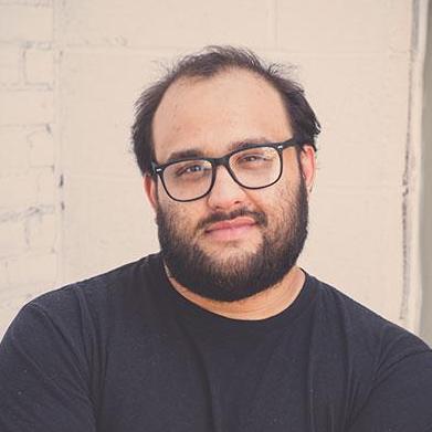 A headshot of Mark Anthony Cianfrani, half asleep